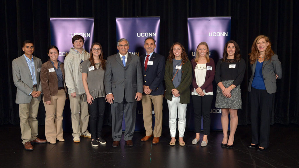 (from Left to Right): Param Bidja, UConn student, 2019, Computer Science & Engineering; Zoe Esponda, UConn student, 2017, Environmental Science; Nicholas McInnis, UConn student, Pharmacy; Danielle McPherson, UConn student, Pharmacy; Senator Len Fasano; Representative Dave Yaccarino; Margaret Sullivan, UConn Student, 2018, Accounting; Rebecca Kalkowski, UConn student, 2017, Nursing; Angela DeFillippo, UConn student 2018, Business; UConn President Susan Herbst